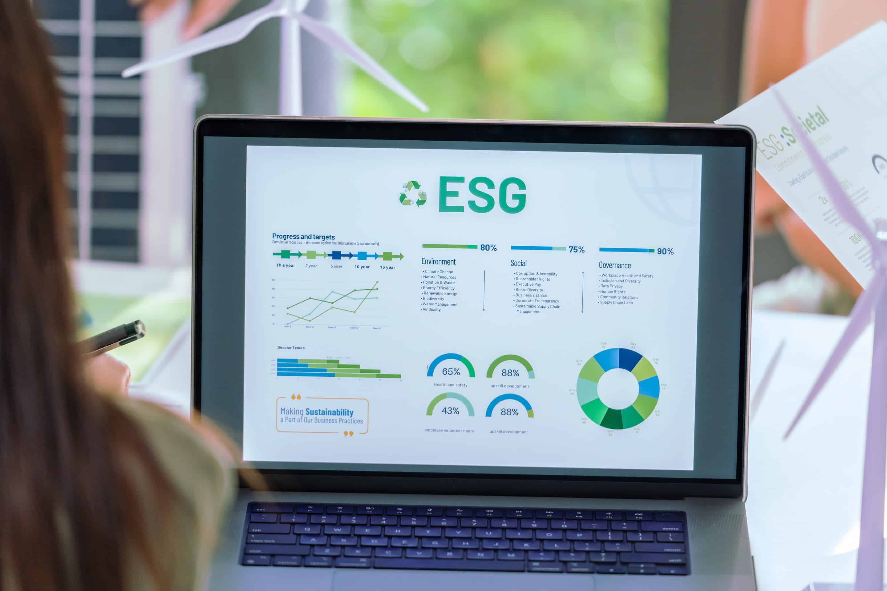 Happy group of volunteers stacking hands